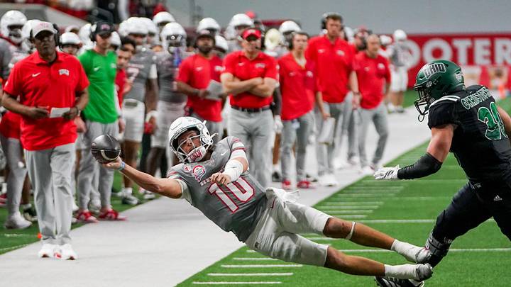 Anthony Colandrea, with UNLV, attempts a pass against Ohio University in the Frisco Bowl last season.