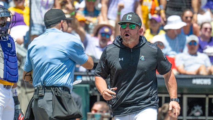 Jun 22, 2025; Omaha, Neb, USA;  Coastal Carolina Chanticleers head coach Kevin Schnall (9) gets thrown out of the game arguing with the umpires during the game against the LSU Tigers during the first inning at Charles Schwab Field. Mandatory Credit: Steven Branscombe-Imagn Images Jun 22, 2025; Omaha, Neb, USA;  Coastal Carolina Chanticleers head coach Kevin Schnall (9) gets thrown out of the game arguing with the umpires during the game against the LSU Tigers during the first inning at Charles Schwab Field. Mandatory Credit: Steven Branscombe-Imagn Images