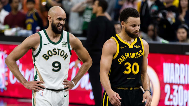 Boston Celtics guard Derrick White (9) and Golden State Warriors guard Stephen Curry (30) on the court during the overtime period at Chase Center. Mandatory Credit: John Hefti-Imagn Images