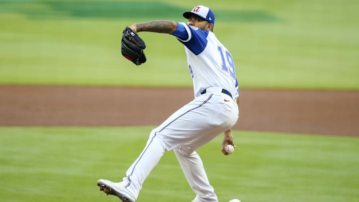 Apr 12, 2021; Atlanta, Georgia, USA; Atlanta Braves starting pitcher Huascar Ynoa (19) throws