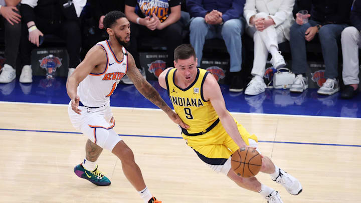 May 21, 2025; New York, New York, USA; Indiana Pacers guard T.J. McConnell (9) controls the ball against New York Knicks guard Cameron Payne (1) in the second quarter during game one of the eastern conference finals for the 2025 NBA Playoffs at Madison Square Garden. Mandatory Credit: Wendell Cruz-Imagn Images