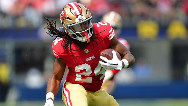 Sep 22, 2024; Inglewood, California, USA; San Francisco 49ers running back Jordan Mason (24) runs the ball against the Los Angeles Rams during the first half at SoFi Stadium. Mandatory Credit: Gary A. Vasquez-Imagn Images