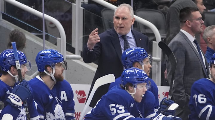 Mar 25, 2026; Toronto, Ontario, CAN; Toronto Maple Leafs head coach Craig Berube directs a player onto the ice during the third period against the New York Rangers at Scotiabank Arena. Mandatory Credit: John E. Sokolowski-Imagn Images