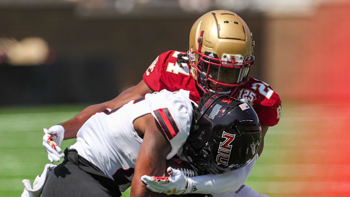 Sep 2, 2023; Chestnut Hill, Massachusetts, USA; Boston College Eagles cornerback Amari Jackson (24) tackles Northern Illinois Huskies receiver Trayvon Rudolph at Alumni Stadium.