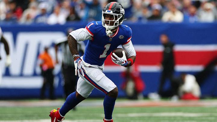 Oct 4, 2026; East Rutherford, New Jersey, USA;  New York Giants wide receiver Malik Nabers (1) runs the ball during the third quarter at MetLife Stadium.  Mandatory Credit: Vincent Carchietta-Imagn Images