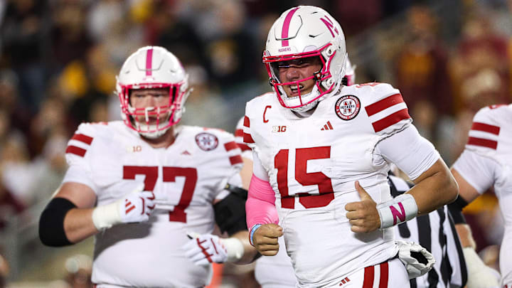 Oct 17, 2025; Minneapolis, Minnesota, USA; Nebraska Cornhuskers quarterback Dylan Raiola (15) runs off the field during the first half against the Minnesota Golden Gophers at Huntington Bank Stadium. Mandatory Credit: Matt Krohn-Imagn Images