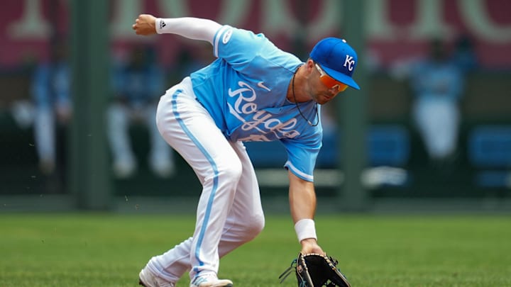 Jul 27, 2022; Kansas City, Missouri, USA; Kansas City Royals second baseman Whit Merrifield (15) fields a ground ball during the fourth inning against the Los Angeles Angels at Kauffman Stadium. Mandatory Credit: Jay Biggerstaff-Imagn Images