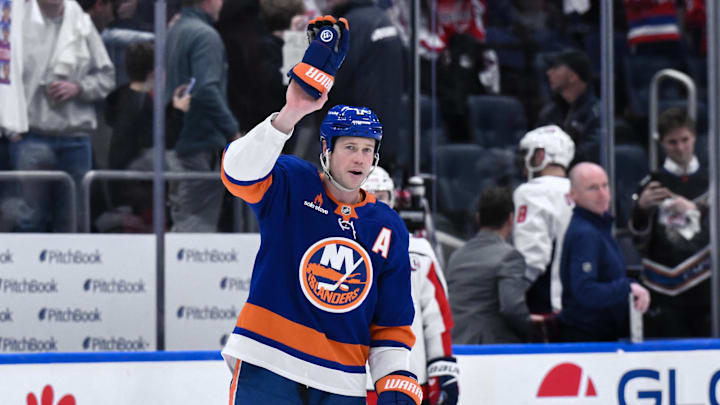 Apr 15, 2025; Elmont, New York, USA; New York Islanders left wing Matt Martin (17) acknowledges the crowd after the game against the Washington Capitals at UBS Arena. Mandatory Credit: John Jones-Imagn Images