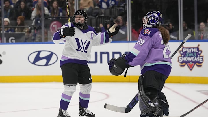 Feb 1, 2024; Toronto, Ontario, CANADA; Team King forward Kendall Coyne Schofield (26) celebrates her goal against Team Kloss goaltender Nicole Hensley (29) during the PWHL 3-on-3 Showcase during NHL All-Star Thursday at Scotiabank Arena. Mandatory Credit: John E. Sokolowski-Imagn Images