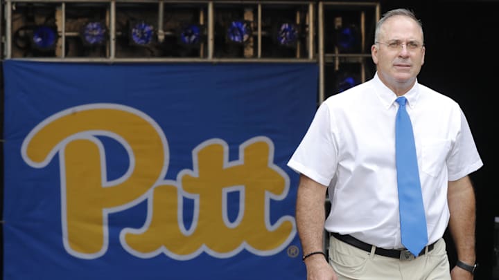 Sep 21, 2024; Pittsburgh, Pennsylvania, USA;  Pittsburgh Panthers head coach Pat Narduzzi takes the field to lead the Panthers in warm ups before playing the Youngstown State Penguins at Acrisure Stadium. Mandatory Credit: Charles LeClaire-Imagn Images