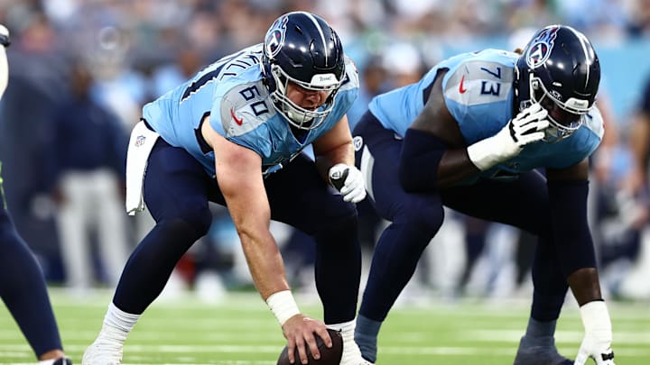 Aug 17, 2024; Nashville, Tennessee, USA; Tennessee Titans offensive tackle Daniel Brunskill (60) and offensive tackle Lachavious Simmons (73) set up for a play in the second quarter against the Seattle Seahawks at Nissan Stadium. Mandatory Credit: Casey Gower-Imagn Images