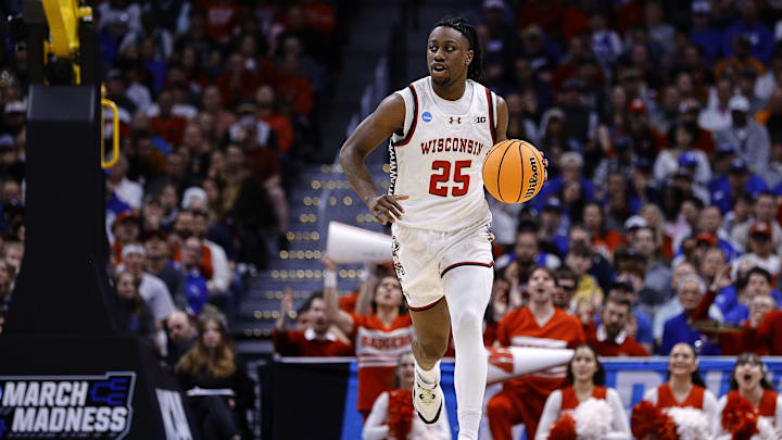 Mar 22, 2025; Denver, CO, USA; Wisconsin Badgers guard John Blackwell (25) dribbles the ball against the Brigham Young Cougars during the first half in the second round of the NCAA Tournament at Ball Arena. Mandatory Credit: Isaiah J. Downing-Imagn Images Mar 22, 2025; Denver, CO, USA; Wisconsin Badgers guard John Blackwell (25) dribbles the ball against the Brigham Young Cougars during the first half in the second round of the NCAA Tournament at Ball Arena. Mandatory Credit: Isaiah J. Downing-Imagn Images