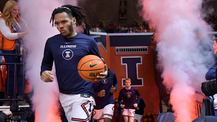 Jan 27, 2024; Champaign, Illinois, USA;  Illinois Fighting Illini forward Ty Rodgers (20) leads
