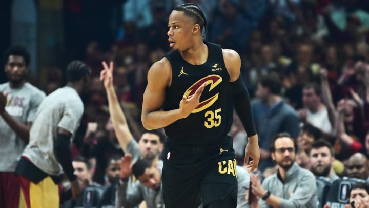 Mar 5, 2024; Cleveland, Ohio, USA;  Cleveland Cavaliers forward Isaac Okoro (35) celebrates after hitting a three point basket during the first half against the Boston Celtics at Rocket Mortgage FieldHouse. Mandatory Credit: Ken Blaze-USA TODAY Sports