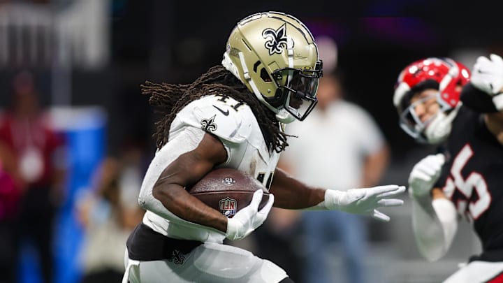 Sep 29, 2024; Atlanta, Georgia, USA; New Orleans Saints running back Alvin Kamara (41) runs the ball against the Atlanta Falcons in the second quarter at Mercedes-Benz Stadium. Mandatory Credit: Brett Davis-Imagn Images