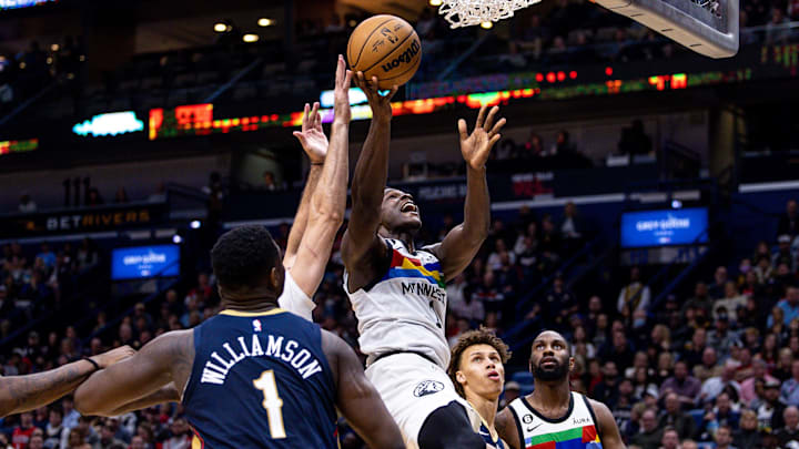 Dec 28, 2022; New Orleans, Louisiana, USA; Minnesota Timberwolves guard Anthony Edwards (1) drives to the basket against New Orleans Pelicans forward Zion Williamson (1) during the second half at Smoothie King Center. Mandatory Credit: Stephen Lew-Imagn Images Dec 28, 2022; New Orleans, Louisiana, USA; Minnesota Timberwolves guard Anthony Edwards (1) drives to the basket against New Orleans Pelicans forward Zion Williamson (1) during the second half at Smoothie King Center. Mandatory Credit: Stephen Lew-Imagn Images