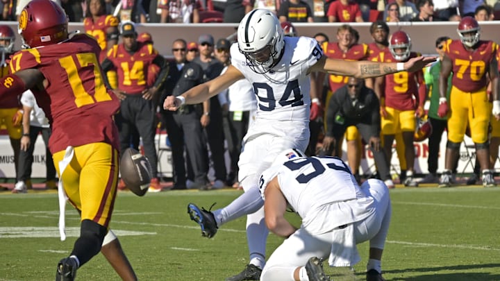 Oct 12, 2024; Los Angeles, California, USA; USC Penn State Nittany Lions place kicker Ryan Barker (94) hits a field goal in overtime to defeat the USC Trojans at United Airlines Field at the Los Angeles Memorial Coliseum. Mandatory Credit: Jayne Kamin-Oncea-Imagn Images
