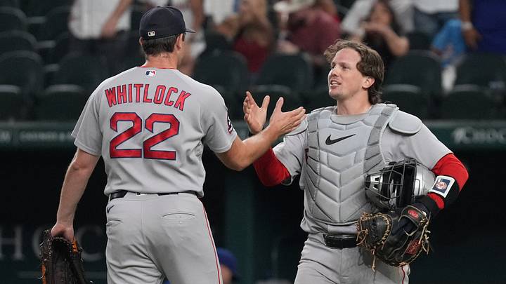 Sep 17, 2026; Arlington, Texas, USA; Boston Red Sox pitcher Garrett Whitlock (22) and catcher Adley Rutschman (31) shake hands after defeating the Texas Rangers at Globe Life Field. Mandatory Credit: Raymond Carlin III-Imagn Images Sep 17, 2026; Arlington, Texas, USA; Boston Red Sox pitcher Garrett Whitlock (22) and catcher Adley Rutschman (31) shake hands after defeating the Texas Rangers at Globe Life Field. Mandatory Credit: Raymond Carlin III-Imagn Images