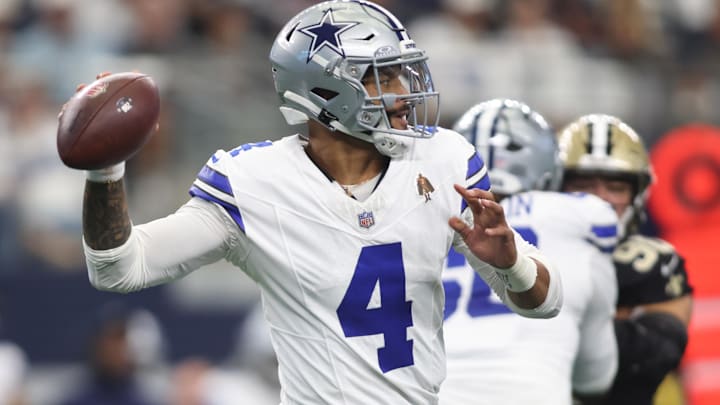 Sep 15, 2024; Arlington, Texas, USA; Dallas Cowboys quarterback Dak Prescott (4) throws against the New Orleans Saints in the first quarter  at AT&T Stadium. 