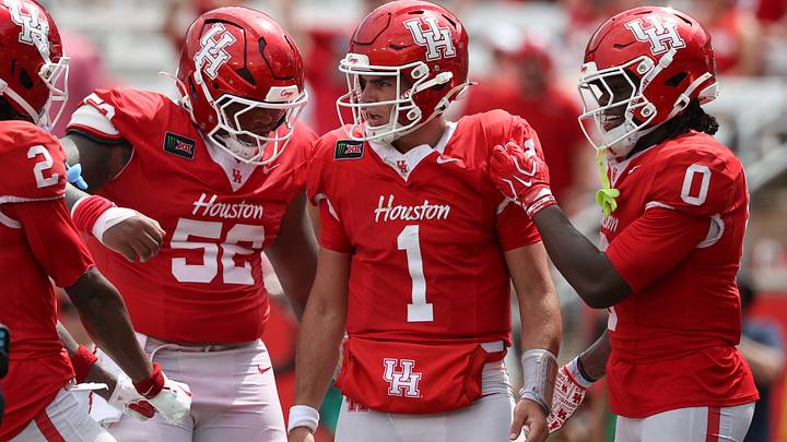 Sep 5, 2026; Houston, Texas, USA; Houston Cougars quarterback Conner Weigman (1) reacts with offensive lineman Anthony Boswell (52) and wide receiver Amare Thomas (0) after a play during the fourth quarter against the Oregon State Beavers at TDECU Stadium. Mandatory Credit: Troy Taormina-Imagn Images Sep 5, 2026; Houston, Texas, USA; Houston Cougars quarterback Conner Weigman (1) reacts with offensive lineman Anthony Boswell (52) and wide receiver Amare Thomas (0) after a play during the fourth quarter against the Oregon State Beavers at TDECU Stadium. Mandatory Credit: Troy Taormina-Imagn Images