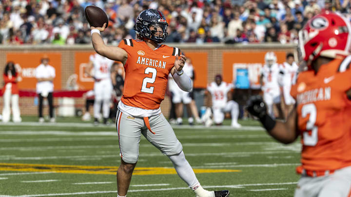 Feb 1, 2025; Mobile, AL, USA; American team quarterback Jaxson Dart of Ole Miss (2) during the first half of the 2025 Senior Bowl football game against the National team at Hancock Whitney Stadium.  