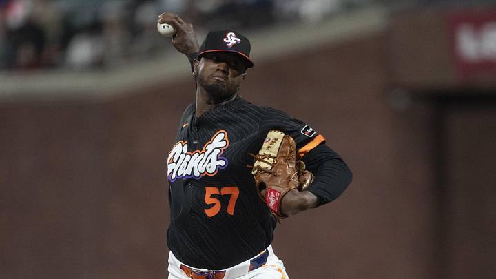May 5, 2026; San Francisco, California, USA; San Francisco Giants pitcher Gregory Santos (57) pitches during the seventh inning against the San Diego Padres at Oracle Park. Mandatory Credit: Stan Szeto-Imagn Images