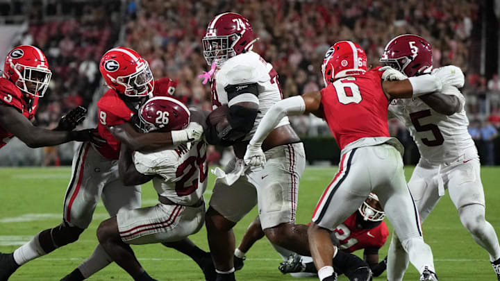 Sep 27, 2025; Athens, Georgia, USA; Alabama Crimson Tide offensive lineman Kadyn Proctor (74) runs against the Georgia Bulldogs in the first half at Sanford Stadium. Mandatory Credit: Dale Zanine-Imagn Images Sep 27, 2025; Athens, Georgia, USA; Alabama Crimson Tide offensive lineman Kadyn Proctor (74) runs against the Georgia Bulldogs in the first half at Sanford Stadium. Mandatory Credit: Dale Zanine-Imagn Images