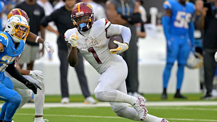 Oct 5, 2025; Inglewood, California, USA; Washington Commanders wide receiver Deebo Samuel Sr. (1) runs against the Los Angeles Chargers at SoFi Stadium. Mandatory Credit: Jayne Kamin-Oncea-Imagn Images