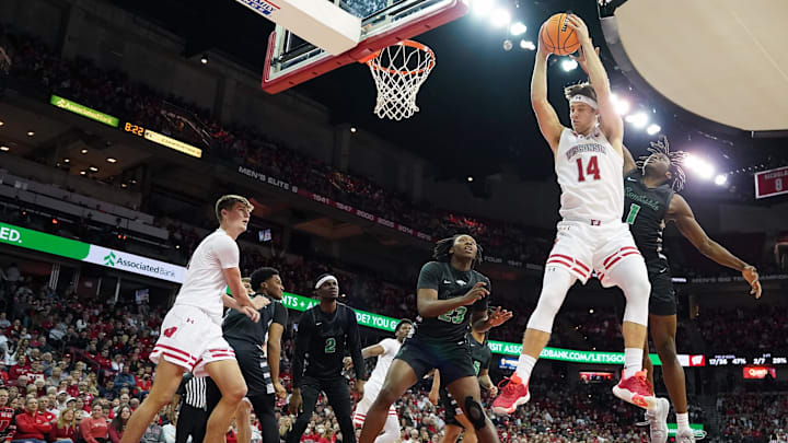 Dec 22, 2023; Madison, Wisconsin, USA; Wisconsin Badgers forward Carter Gilmore (14) rebounds the ball.