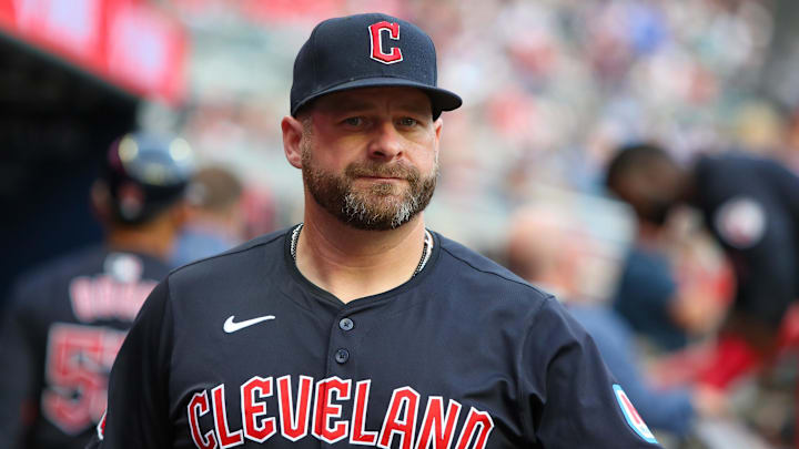 Apr 27, 2024; Atlanta, Georgia, USA; Cleveland Guardians manager Stephen Vogt (12) in the dugout before a game against the Atlanta Braves at Truist Park. Mandatory Credit: Brett Davis-Imagn Images