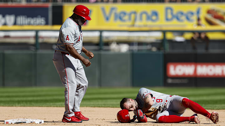 Los Angeles Angels shortstop Zach Neto (9) reacts after injuring himself during the fourth inning of a baseball game against the Chicago White Sox at Guaranteed Rate Field on Sept 26. Los Angeles Angels shortstop Zach Neto (9) reacts after injuring himself during the fourth inning of a baseball game against the Chicago White Sox at Guaranteed Rate Field on Sept 26.