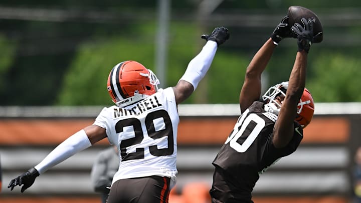 Jun 10, 2025; Berea, OH, USA; Cleveland Browns wide receiver Jamari Thrash (80) catches a pass as cornerback Cameron Mitchell (29) defends during minicamp at CrossCountry Mortgage Campus. Mandatory Credit: Ken Blaze-Imagn Images