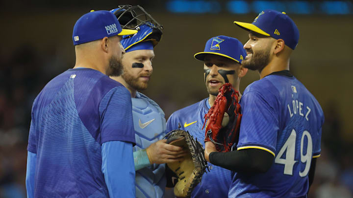Minnesota Twins starting pitcher Pablo Lopez (49) smiles at manager Rocco Baldelli as he leaves the game against the Toronto Blue Jays in the eighth inning at Target Field in Minneapolis on Aug. 30, 2024.