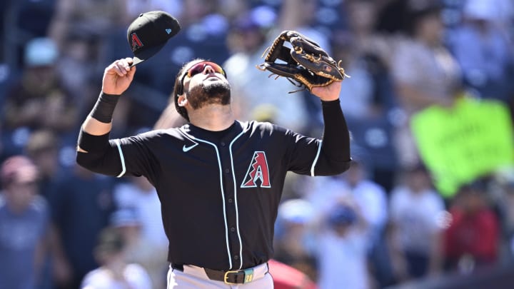 Jul 7, 2024; San Diego, California, USA; Arizona Diamondbacks third baseman Eugenio Suarez (28) celebrates on the field after defeating the San Diego Padres at Petco Park. Mandatory Credit: Orlando Ramirez-USA TODAY Sports