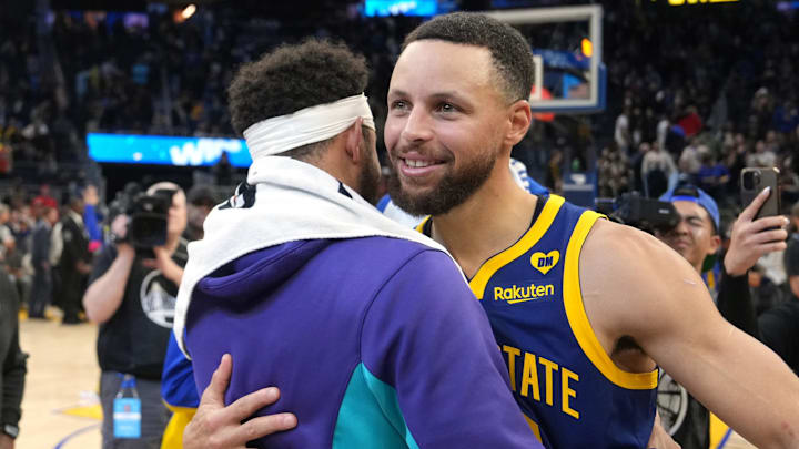 Feb 23, 2024; San Francisco, California, USA; Golden State Warriors guard Stephen Curry (right) hugs Charlotte Hornets guard Seth Curry (left) after the game at Chase Center. Mandatory Credit: Darren Yamashita-Imagn Images Feb 23, 2024; San Francisco, California, USA; Golden State Warriors guard Stephen Curry (right) hugs Charlotte Hornets guard Seth Curry (left) after the game at Chase Center. Mandatory Credit: Darren Yamashita-Imagn Images