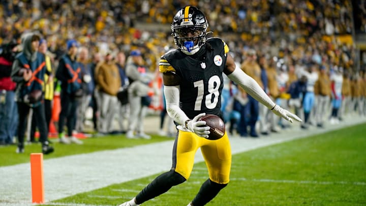 Pittsburgh Steelers wide receiver Diontae Johnson (18) scores a touchdown against the Tennessee Titans during the fourth quarter in Pittsburgh, Pa., Thursday, Nov. 2, 2023.