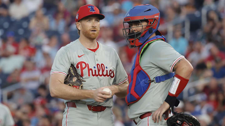 Mar 15, 2024; West Palm Beach, Florida, USA; Philadelphia Phillies catcher Cam Gallagher, right,