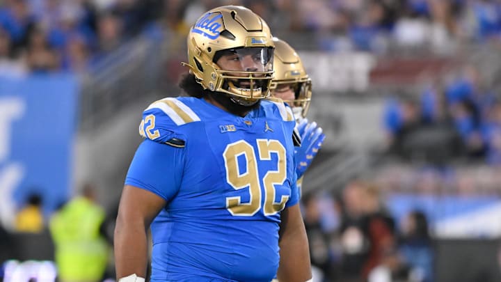 UCLA Bruins defensive lineman Siale Taupaki (92)