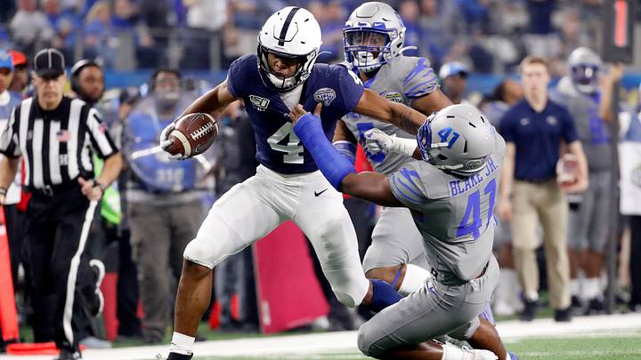 Penn State's Journey Brown (4) pushes off Memphis' Sanchez Blake Jr. (41) as he rushes the ball Saturday, Dec. 28, 2019, during the Goodyear Cotton Bowl Classic at AT&T Stadium in Arlington, Texas. Penn State's Journey Brown (4) pushes off Memphis' Sanchez Blake Jr. (41) as he rushes the ball Saturday, Dec. 28, 2019, during the Goodyear Cotton Bowl Classic at AT&T Stadium in Arlington, Texas.