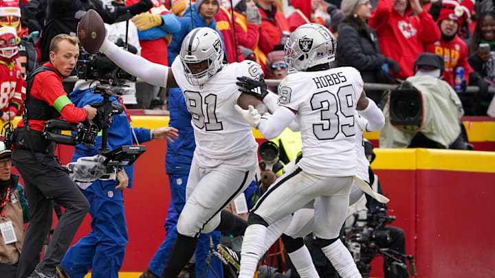 Dec 25, 2023; Kansas City, Missouri, USA; Las Vegas Raiders defensive tackle Bilal Nichols (91) scores against the Kansas City Chiefs after picking up a fumble during the first half at GEHA Field at Arrowhead Stadium. Mandatory Credit: Denny Medley-USA TODAY Sports Dec 25, 2023; Kansas City, Missouri, USA; Las Vegas Raiders defensive tackle Bilal Nichols (91) scores against the Kansas City Chiefs after picking up a fumble during the first half at GEHA Field at Arrowhead Stadium. Mandatory Credit: Denny Medley-USA TODAY Sports