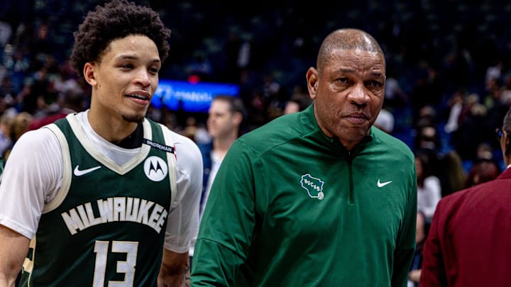 Apr 6, 2025; New Orleans, Louisiana, USA; Milwaukee Bucks head coach Doc Rivers and guard Ryan Rollins (13) walk to the locker room after the game against the New Orleans Pelicans at Smoothie King Center. Mandatory Credit: Stephen Lew-Imagn Images Apr 6, 2025; New Orleans, Louisiana, USA; Milwaukee Bucks head coach Doc Rivers and guard Ryan Rollins (13) walk to the locker room after the game against the New Orleans Pelicans at Smoothie King Center. Mandatory Credit: Stephen Lew-Imagn Images