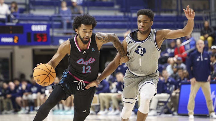 Jan 24, 2024; Houston, Texas, USA; Rice Owls guard Noah Shelby (1) defends against Florida Atlantic Owls guard Jalen Gaffney (12) during the second half at Tudor Fieldhouse. Mandatory Credit: Troy Taormina-Imagn Images Jan 24, 2024; Houston, Texas, USA; Rice Owls guard Noah Shelby (1) defends against Florida Atlantic Owls guard Jalen Gaffney (12) during the second half at Tudor Fieldhouse. Mandatory Credit: Troy Taormina-Imagn Images