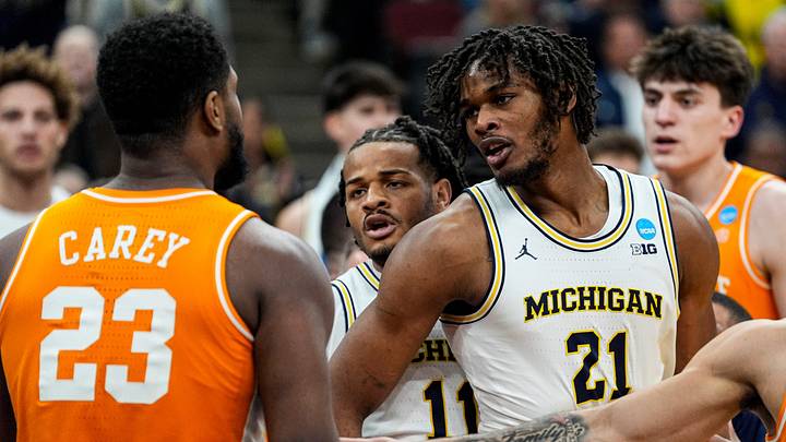 Michigan forward Morez Johnson Jr. (21) argues with Tennessee forward Jaylen Carey (23) during the second half of NCAA Tournament Elite 8 round at United Center in Chicago on Sunday, March 29, 2026. Michigan forward Morez Johnson Jr. (21) argues with Tennessee forward Jaylen Carey (23) during the second half of NCAA Tournament Elite 8 round at United Center in Chicago on Sunday, March 29, 2026.
