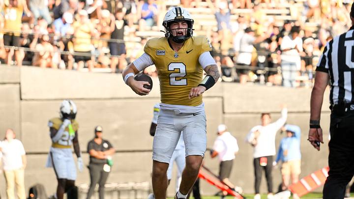 Sep 12, 2026; Nashville, Tennessee, USA; Vanderbilt Commodores quarterback Jared Curtis (2) celebrates his touchdown against the Delaware Blue Hens during the second half at FirstBank Stadium. Mandatory Credit: Steve Roberts-Imagn Images Sep 12, 2026; Nashville, Tennessee, USA; Vanderbilt Commodores quarterback Jared Curtis (2) celebrates his touchdown against the Delaware Blue Hens during the second half at FirstBank Stadium. Mandatory Credit: Steve Roberts-Imagn Images