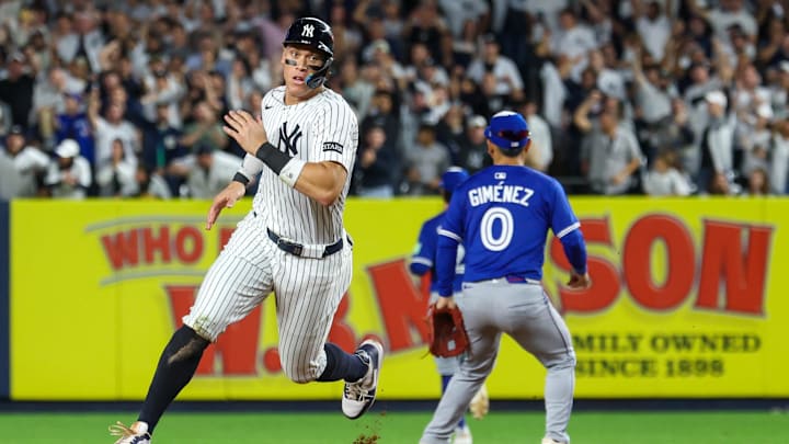 Oct 7, 2025; Bronx, New York, USA; New York Yankees outfielder Aaron Judge (99) rounds the bases after a double hit by Cody Bellinger (35) (not pictured) in the sixth inning against the Toronto Blue Jays during game three of the ALDS round for the 2025 MLB playoffs at Yankee Stadium. Mandatory Credit: Vincent Carchietta-Imagn Images Oct 7, 2025; Bronx, New York, USA; New York Yankees outfielder Aaron Judge (99) rounds the bases after a double hit by Cody Bellinger (35) (not pictured) in the sixth inning against the Toronto Blue Jays during game three of the ALDS round for the 2025 MLB playoffs at Yankee Stadium. Mandatory Credit: Vincent Carchietta-Imagn Images