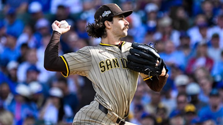 Former San Diego Padres starting pitcher Dylan Cease delivers a pitch against the Chicago Cubs in the first inning during game two of the Wildcard round for the 2025 MLB playoffs at Wrigley Field.