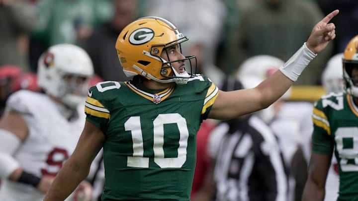 Green Bay Packers quarterback Jordan Love (10) signals first down during the fourth quarter of their game Sunday, October 13, 2024 at Lambeau Field in Green Bay, Wisconsin. The Green Bay Packers beat the Arizona Cardinals 34-13.