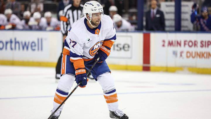 Sep 22, 2026; New York, New York, USA;  New York Islanders defenseman Tony DeAngelo (77) controls the puck in the first period against the New York Rangers at Madison Square Garden.  Mandatory Credit: Wendell Cruz-Imagn Images