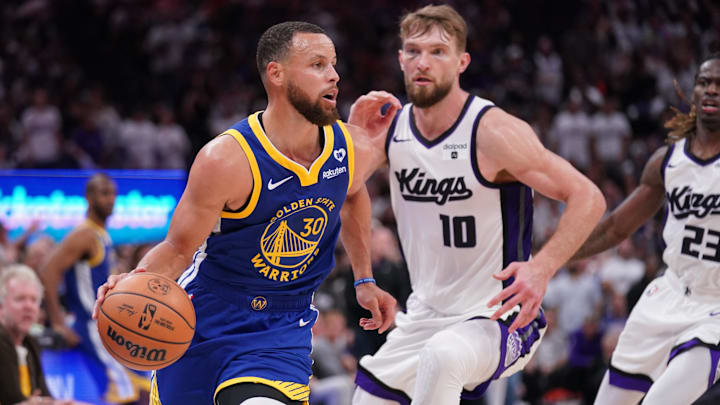 Apr 16, 2024; Sacramento, California, USA; Golden State Warriors guard Stephen Curry (30) dribbles the ball in front of Sacramento Kings forward Domantas Sabonis (10) in the fourth quarter during a play-in game of the 2024 NBA playoffs at the Golden 1 Center. Mandatory Credit: Cary Edmondson-Imagn Images Apr 16, 2024; Sacramento, California, USA; Golden State Warriors guard Stephen Curry (30) dribbles the ball in front of Sacramento Kings forward Domantas Sabonis (10) in the fourth quarter during a play-in game of the 2024 NBA playoffs at the Golden 1 Center. Mandatory Credit: Cary Edmondson-Imagn Images