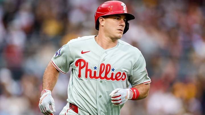 May 26, 2026; San Diego, California, USA; Philadelphia Phillies catcher J.T. Realmuto (10) hits a one run home run during the second inning against the San Diego Padres at Petco Park.
